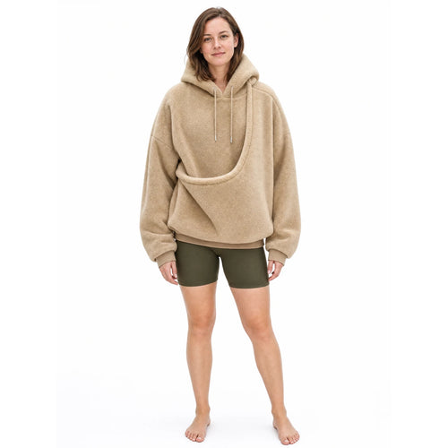 Full length view of the khaki Puppy Pouch Hoodie showing the oversized fit and the carrier opening